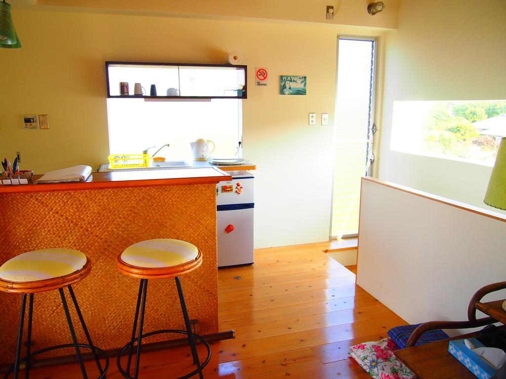 Keiki Beachhouse & Cafe Hotell Nakijin Exteriör bild